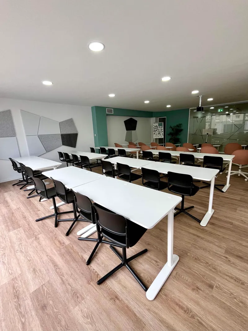 The Cayman Room with tables in rows for a training course